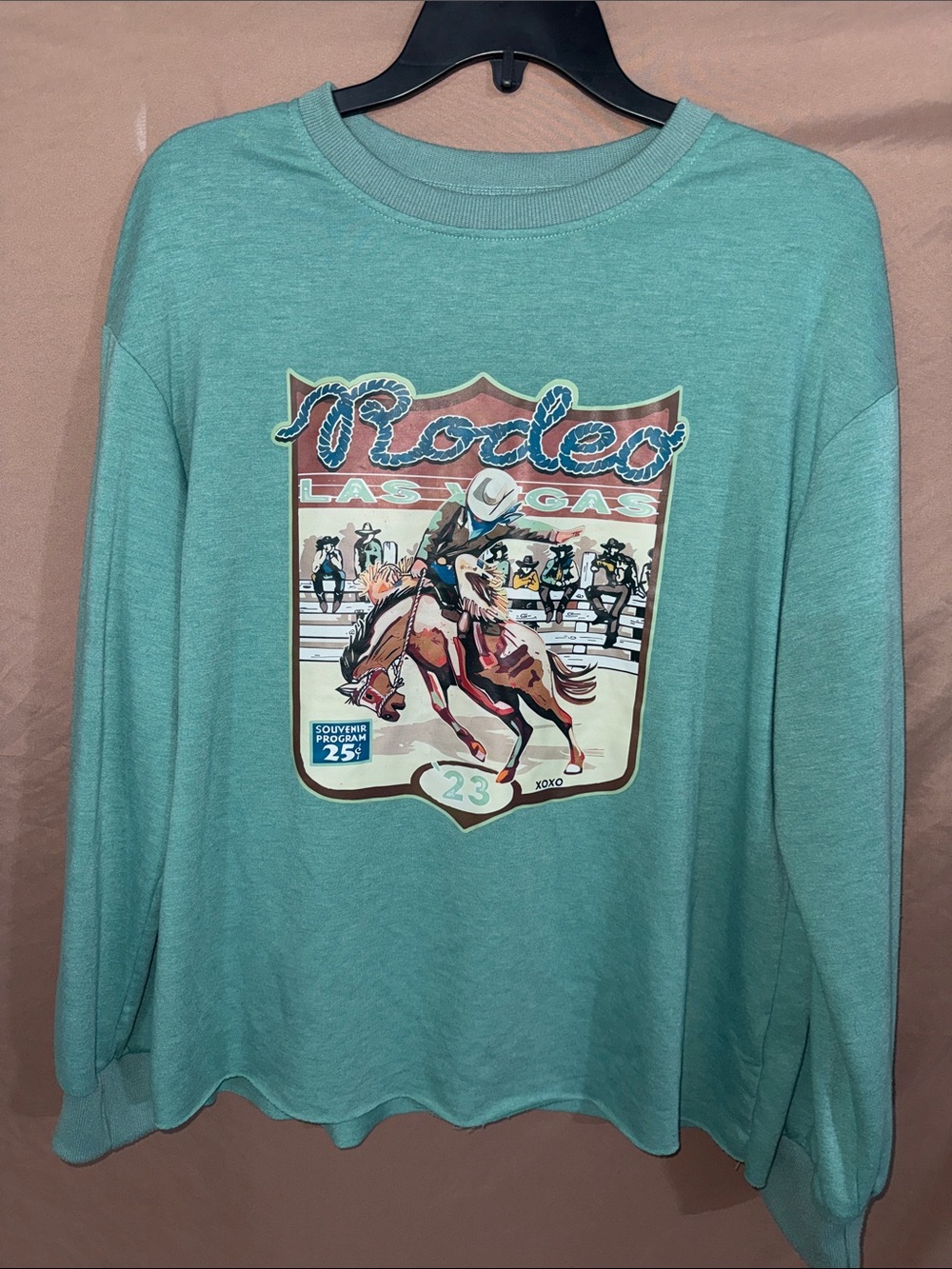 NWOT Women’s Medium Rodeo Las Vegas Graphic Long Sleeve Teal